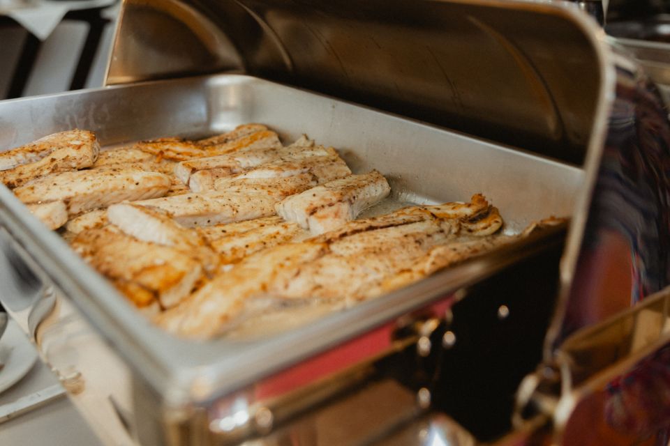Fresh fish being served at an Audubon Event catered by Dickie Brennan & Co. 